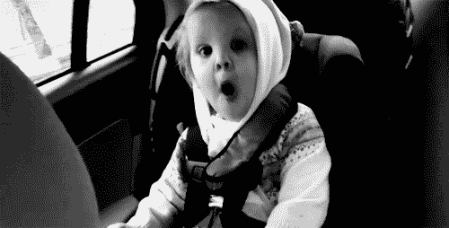 An excited baby celebrating